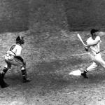 SPECIAL TO BOSTON GLOBE-- Boston Red Sox slugger Ted Williams follows flight of the ball after connecting with a Rip Sewell pitch for a home run in the eighth inning of the All-Star game between American and National Leagues at Fenway Park in Boston July 9, 1946. Massachusetts Gov. William Weld sign legislation Thursday, Dec. 14,1995, at a ceremony naming the new Boston Harbor tunnel for Williams, who will be on hand tomorrow morning when the harbor crossing is christened. (AP Photo/file) LIBRARY TAG 07121999 SPORTS ALL*STAR '99 nytredsox
